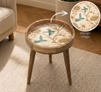 Hummingbird Glass-Top Mango Wood Side Table, styled in a room with an inset showing the printed artwork.