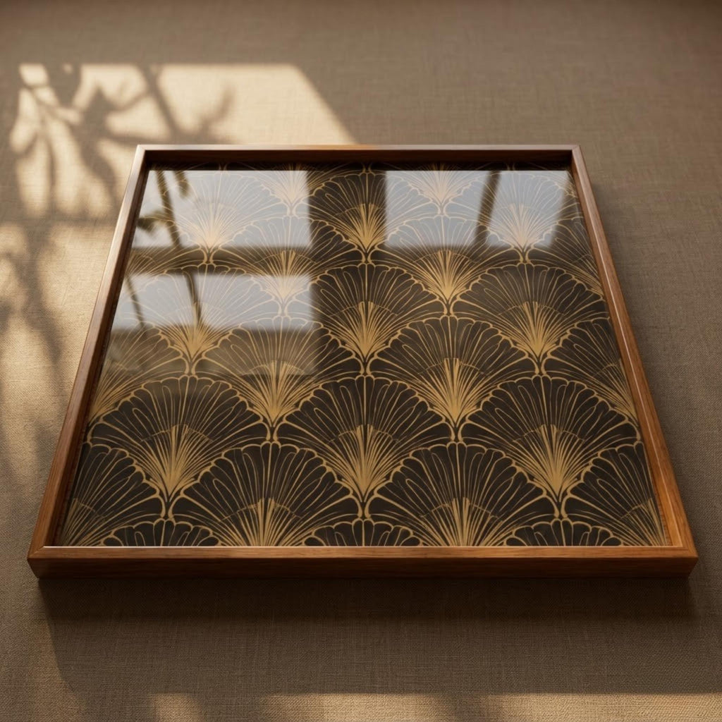 Angled view of the black & gold leaf wooden serving tray.
