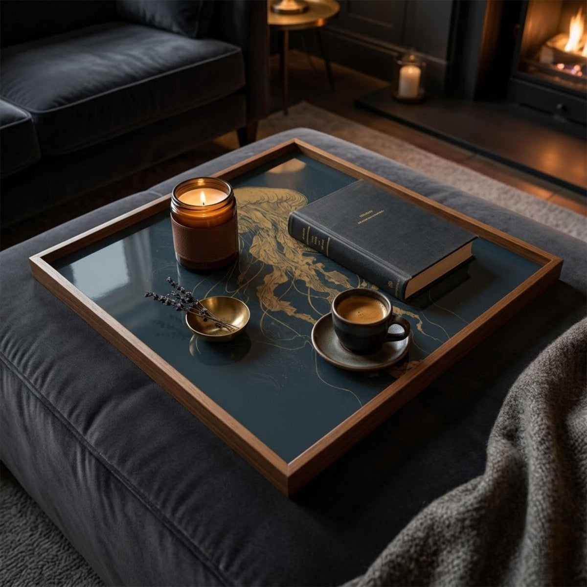 Golden Jellyfish Square Wooden Tray, shown beside a sofa in a styled room.