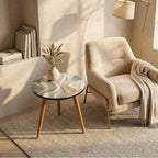Ivory Wave Round Side Table, Glossy Lacquer, shown beside a sofa in a styled room.