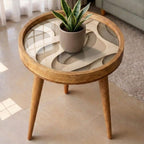 Styled view of the neutral abstract mango wood side table.