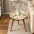 Styled view of the hummingbird print round side table, glossy lacquer.