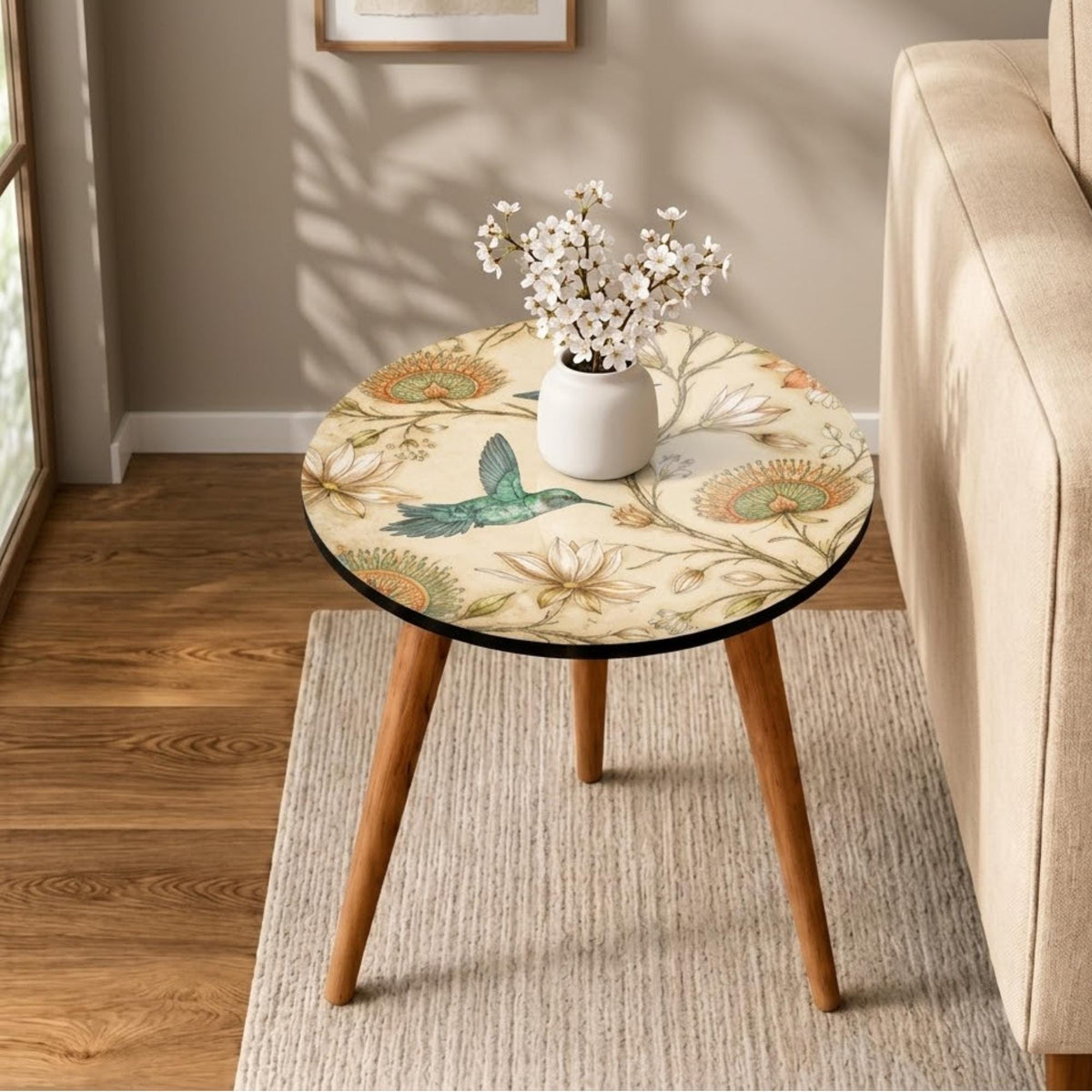 Styled view of the hummingbird print round side table, glossy lacquer.