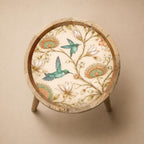Top view of the hummingbird glass-top mango wood side table, showing the printed design.
