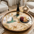 Styled view of the bird & floral mango wood serving tray.