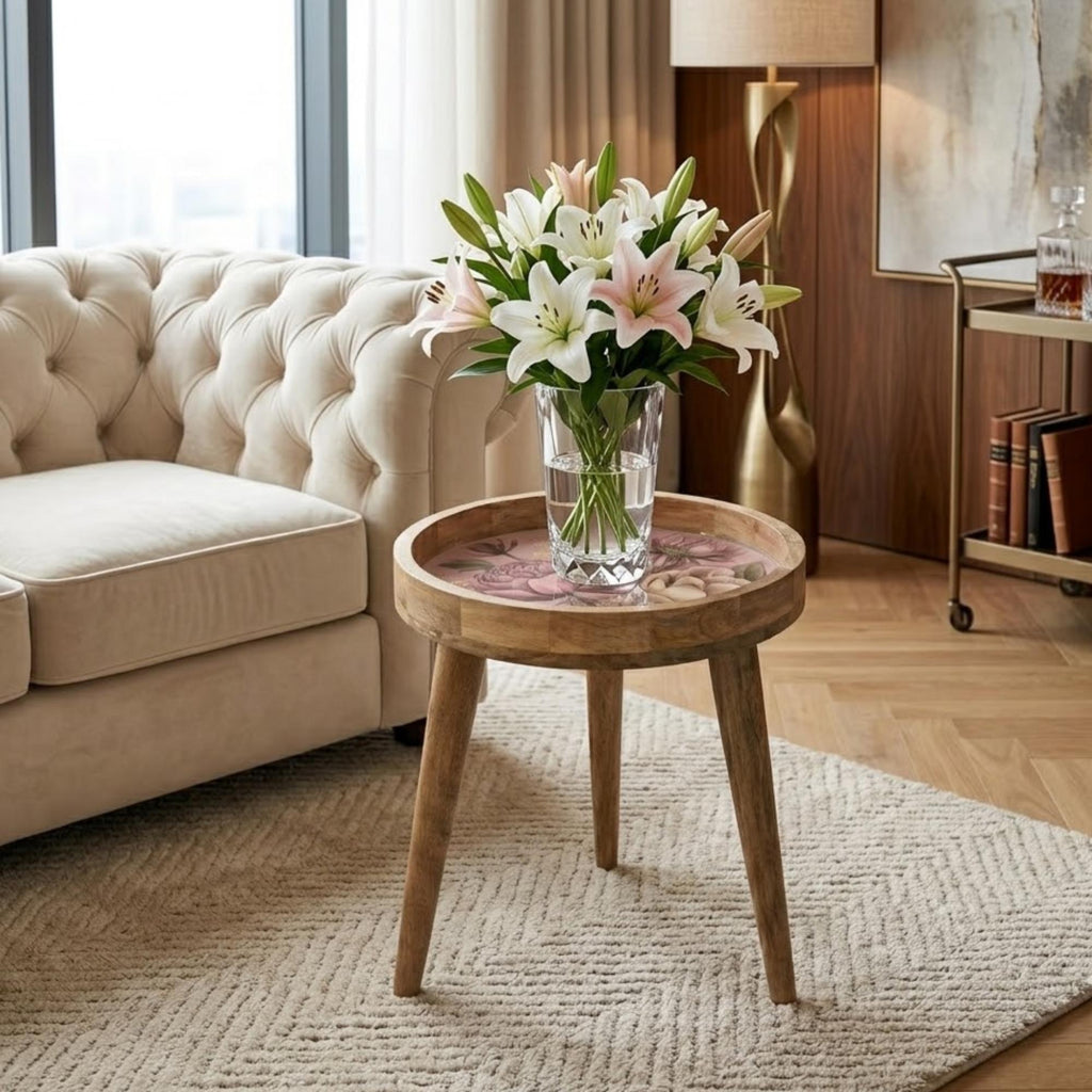 Vintage Rose Mango Wood Side Table, shown beside a sofa in a styled room.