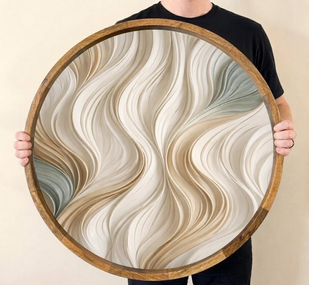 Neutral Wave Mango Wood Serving Tray, held upright to show the printed design and overall shape.