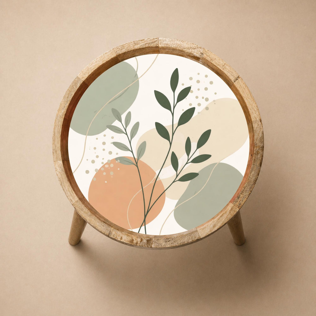 Top view of the minimal botanical mango wood side table, showing the printed design.