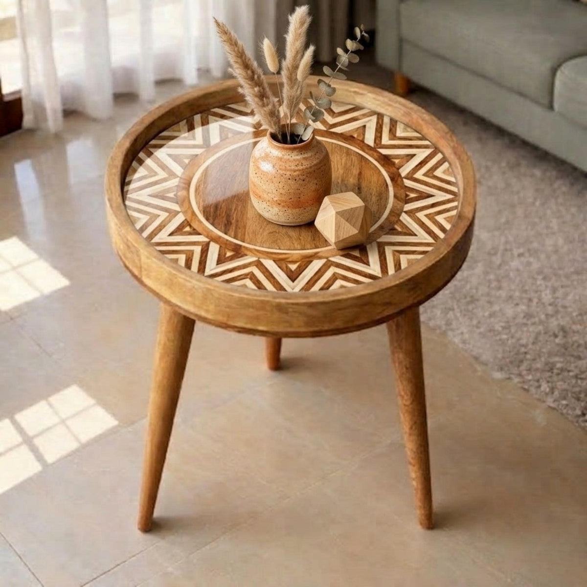 Styled view of the geometric boho mango wood side table.