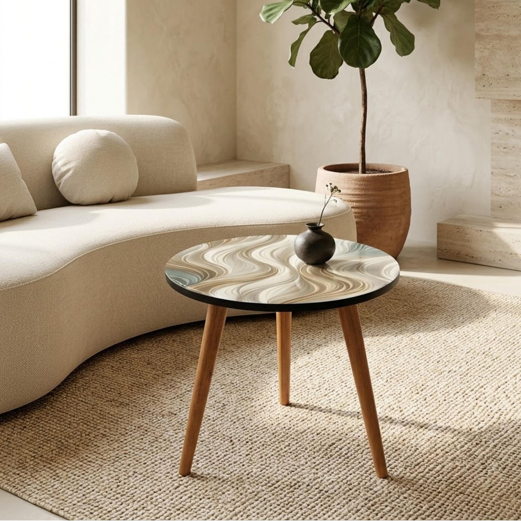 Ivory Wave Round Side Table, Glossy Lacquer, shown beside a sofa in a styled room.