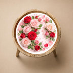 Top view of the rose print glass-top mango wood side table, showing the printed design.