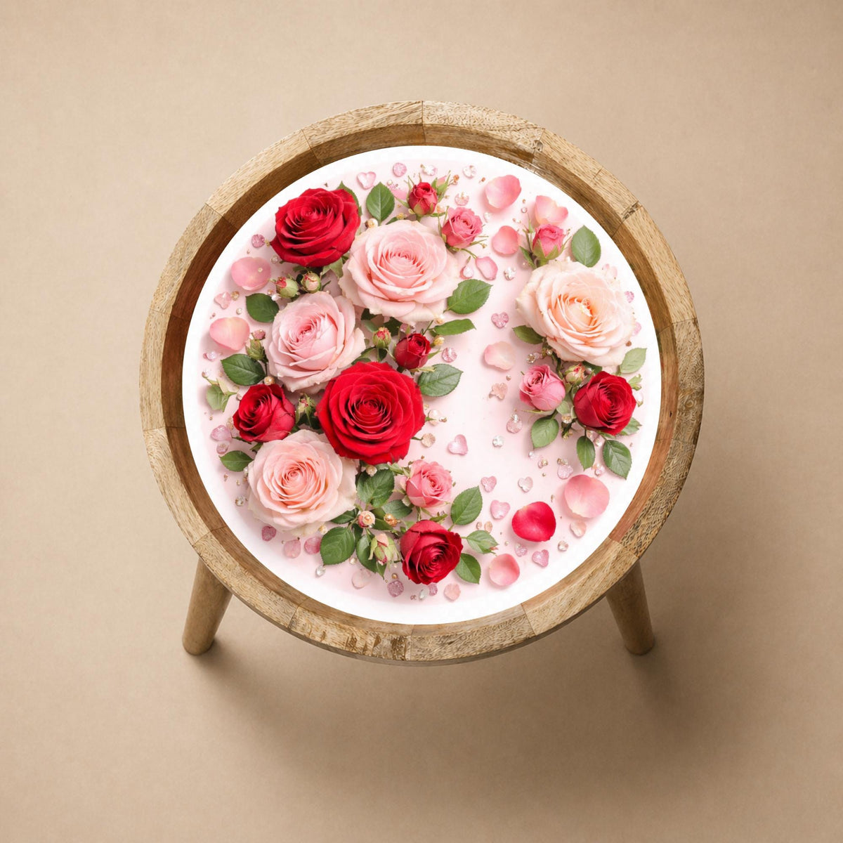 Top view of the rose print glass-top mango wood side table, showing the printed design.