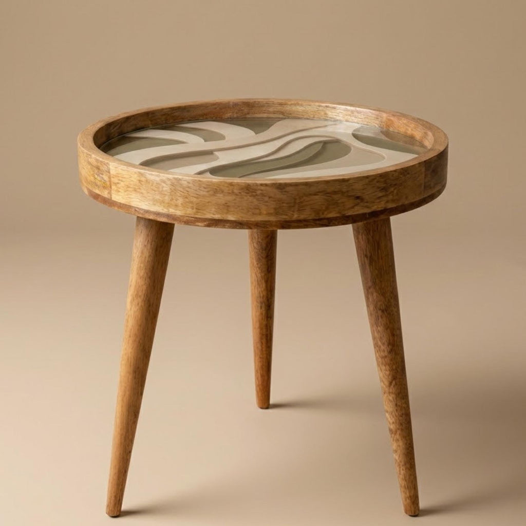 Angled view of the neutral abstract mango wood side table.